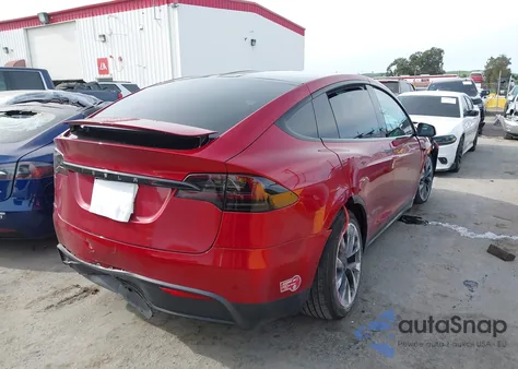 2023 Tesla Model X Dual Motor All-Wheel Drive/Standard Range z USA, uszkodzony, nr VIN 7SAXCBE50PF405571